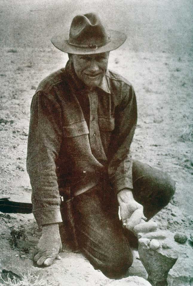 Roy Chapman Andrews inspecting a nest of dinosaur eggs. This work was on display in the original exhibition as item 42. Image source: Matthew, William D.; Granger, Walter. "The most significant fossil finds of the Mongolian expeditions," in: Natural History, vol. 26 (1926), no. 5, pp. 534-535.
