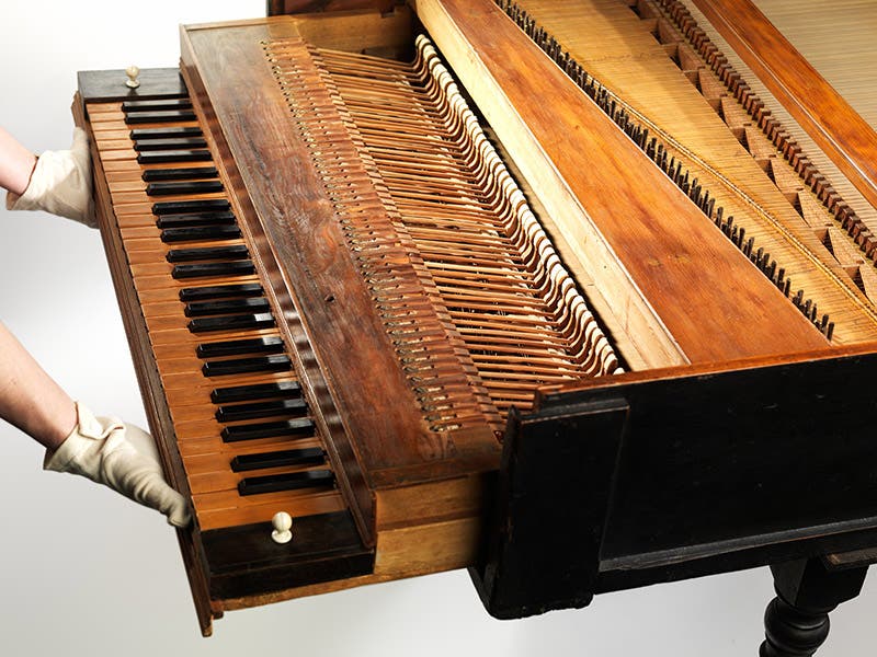 View of the top of the action of the Met Cristofori pianoforte, showing the hammers and keys (metmuseum.org)