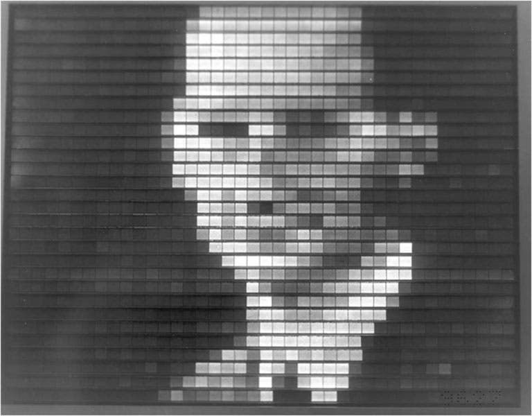 Jan Rajchman, as he appeared on the flat-panel display he demonstrated to RCA’s leadership in 1955. Each of the electroluminescent pixels on this screen was connected to a transfluxor, a multiapertured magnetic core. (David Sarnoff Library Collection, Hagley Museum and Library)