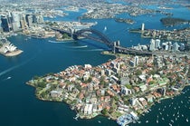 Aerial view of Sydney Harbour Bridge and the Sydney Opera House, recent photograph (Wikimedia commons, Photographer: Rodney Haywood)