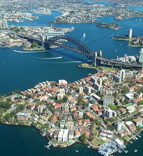 Aerial view of Sydney Harbour Bridge and the Sydney Opera House, recent photograph (Wikimedia commons, Photographer: Rodney Haywood)