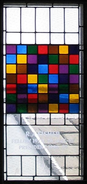 A stained-glass window depicting a Latin square, installed in honor of Ronald Aylmer Fisher in the dining hall at Gonville and Caius College Cambridge in 1989. It was removed in 2020 (Wikimedia commons)
