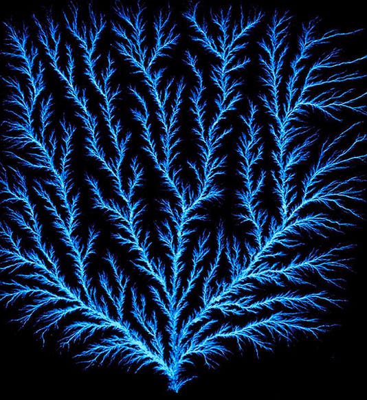A Lichtenberg figure formed in an acrylic block by a high-voltage spark, modern photo (fineartamerica)