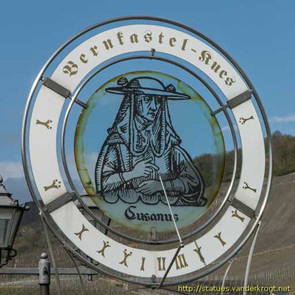 Sundial outside St. Nikolaus-Hospital, Bernkael-Kues, with a portrait of Nicholas of Cusa taken from the woodcut in the Nuremberg Chronicle, 1493 (vanderkrogt.net)