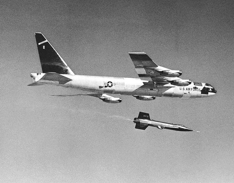 An X-15 being launched from a B-52 mothership, undated photograph (Wikimedia commons)