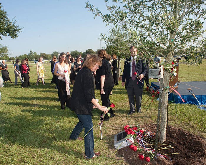 A ceremony attended by fellow astronauts at a tree planted in honor of Sally Ride in Astronaut Memorial Grove, Johnson Space Flight Center, Houston (today.ucsd.edu)