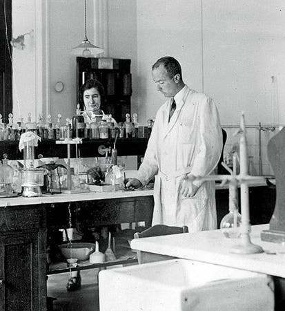 Laboratory at the Radium Institute, Paris, photograph, 1930. Marguerite Perey is the woman on the right in the back (New York Times)