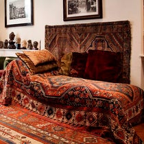 Sigmund Freud’s original psychoanalytic couch, with its Qashqa'i Shekarlu wool carpet, on display in the Freud Museum, London (freud.org.uk)
