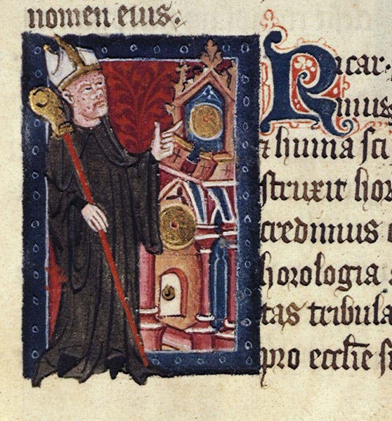 Richard of Wallingford, Abbot of St. Albans, pointing to his clock in the south transept, with marks of leprosy on his face, illumination, MS Cotton Nero D.7, fol. 20r, 14h-century, British Museum (Wikimedia commons)