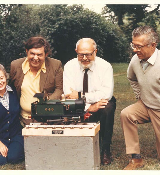 Margaret Burbidge, Geoffrey Burbidge, Willy Fowler, and Fred Hoyle, on the occasion of Fowler’s 60th birthday in 1971, when he received a model steam locomotive for a present (jon.cam.ac.uk)