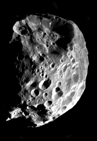 Saturn’s moon Phoebe, discovered by William Pickering, 1899, and here shown as photographed by the Cassini spacecraft, 2004