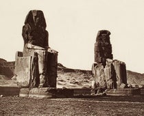 The Colossi of Memnon on the plains of Thebes, detail of  photograph by William de Wiveleslie Abney, in his Thebes and its Five Greater Temples, page 2r, 1876, University Library, Heidelberg (digi.ub.uni-heidelberg.de)
