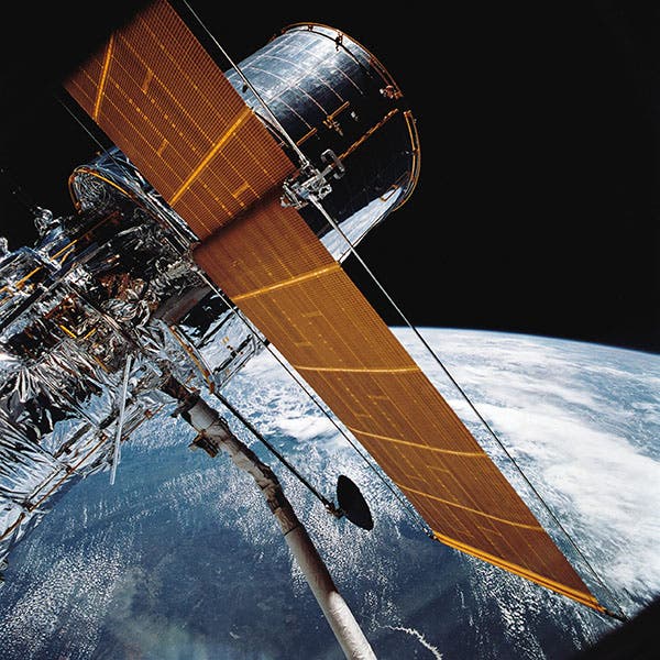 The Hubble Space Telescope, with its new solar panels, being redeployed after repairs by the crew of STS-61 (appel.nasa.gov)
