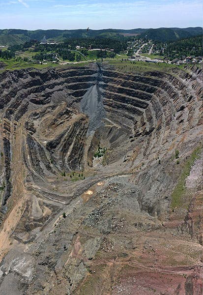 Aerial view of the Homestake Mine, an open-pit gold mine, Lead, South Dakota (Wikimedia commons)