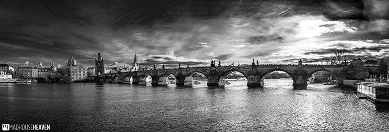 A wonderful view of the Charles Bridge under leaden skies, looking toward Old Town, modern photograph, uncredited (thenextcrossing.com)