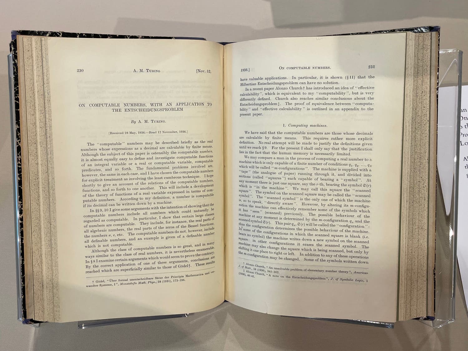 Photo of book containing writing by Alan Turing, “On Computable Numbers, with an Application to the Entscheidungsproblem.” Proceedings of the London Mathematical Society. London, 1936.