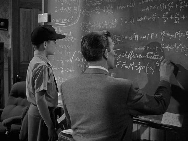 Klaatu correcting an equation on Professor Barnhardt’s blackboard (Scimoviezone.com)