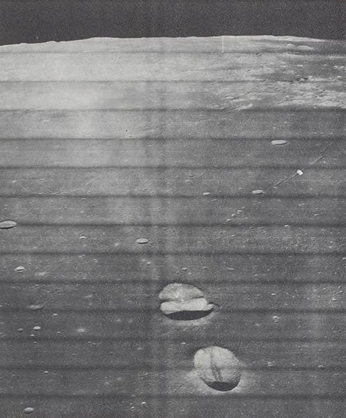 An oblique view of the craters Messier and Messier A, in Mare Fecunditatis, photograph by Lunar Orbiter 5, from The Moon as Viewed by Lunar Orbiter 2, by L.J. Kosofsky and Farouk El-Baz, NASA SP-200, 1970 (Linda Hall Library)