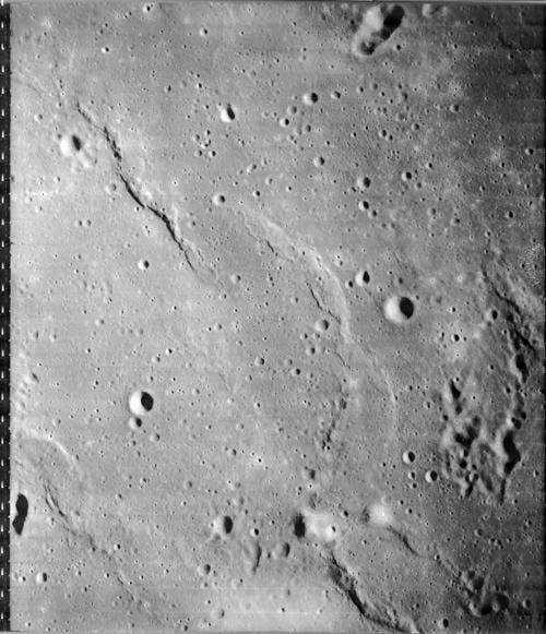 One of the frames taken by Lunar Orbiter 1 (frame 1093) showing a possible Apollo landing site; the bland terrain is a good thing for the future Eagles (lpi.usra.edu)