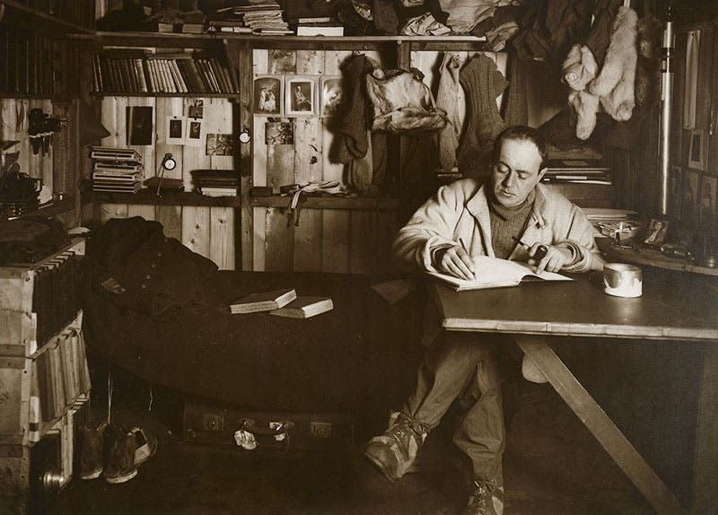 Robert Scott writing in his diary at base camp, Oct. 7, 1911, shortly before setting out for the South Pole, photograph by Herbert Ponting, Royal Collection, Windsor (rct.uk)