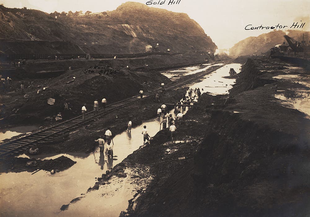 Workers excavate a pressure bulge that heaved up 18 feet from the base of the Culebra Cut.
Throughout Canal construction, unskilled laborers suffered a high rate of pneumonia. During the rainy season, manual laborers were often drenched, and sometimes worked whole days standing in waist-deep water. Some workers, especially in the early days, 
