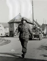 Colonel Boris Pash striding into an unidentified liberated city, undated photograph, ca 1944 (historycollection.com)