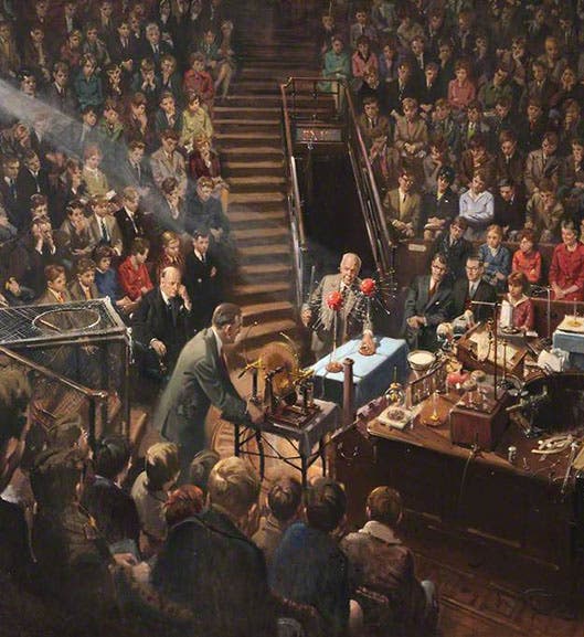 Sir Lawrence Bragg Giving the 1961 Christmas Lectures in the Royal Institution Theatre, oil on canvas, by Terence Cuneo, 1962, The Royal Institution. Bill Coates, one of the Institution’s technicians, can be seen operating a Wimshurst machine. (artuk.org)