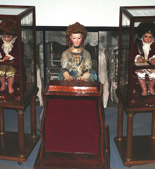 The three Jacque-Droz automata in their room at the Museum of Art and History in Neuchâtel, Switzerland (Wikimedia commons)