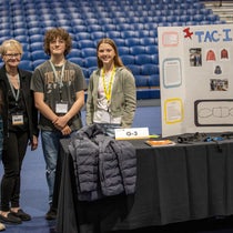 Peggy Kelly with students at the Kansas City Invention Convention