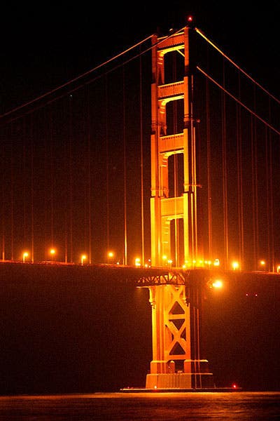 South tower of Golden Gate Bridge at night, with artificial lighting (Wikimedia commons)