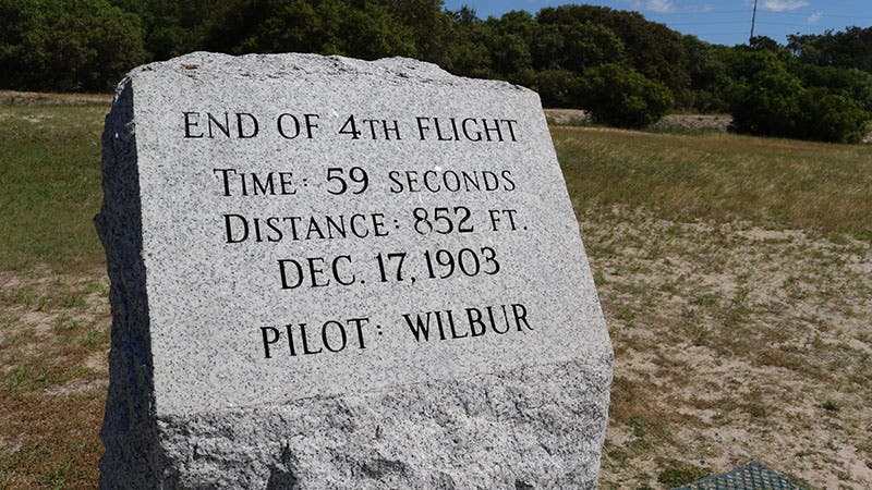 Memorial stone marking the landing-point of the fourth flight of Flyer on Dec. 17, 1903, after a 59-second flight covering 852 feet, with Wilbur at the controls, photograph, National Park Service (nps.gov)
