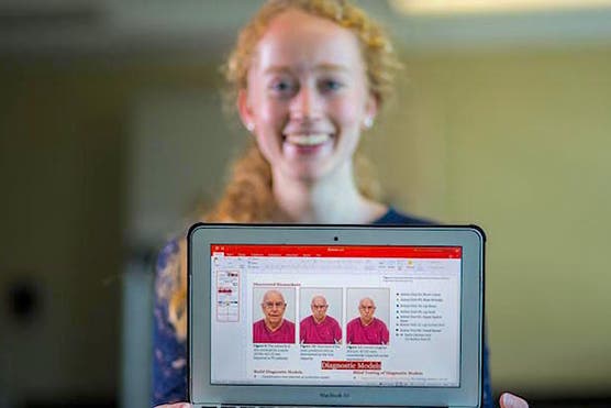 Photo of former Linda Hall Library Shipman Award winner, Erin Smith, showing her FacePrint app.