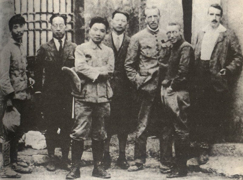 Group portrait of the Sinanthropus crew, including Davidson Black (second from right); Pei Wenzhong (W.C. Pei; far left), who found the first skullcap; and Teilhard du Chardin (third from right), taken at Zoukoudian, 1929 (facebook.com/BuDashung)