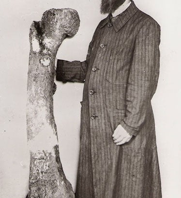 Ernst Stromer and one of the large leg bones found at Bahariya in 1911, now known to be from <i>Bahariasaurus</i> (Wikimedia commons)