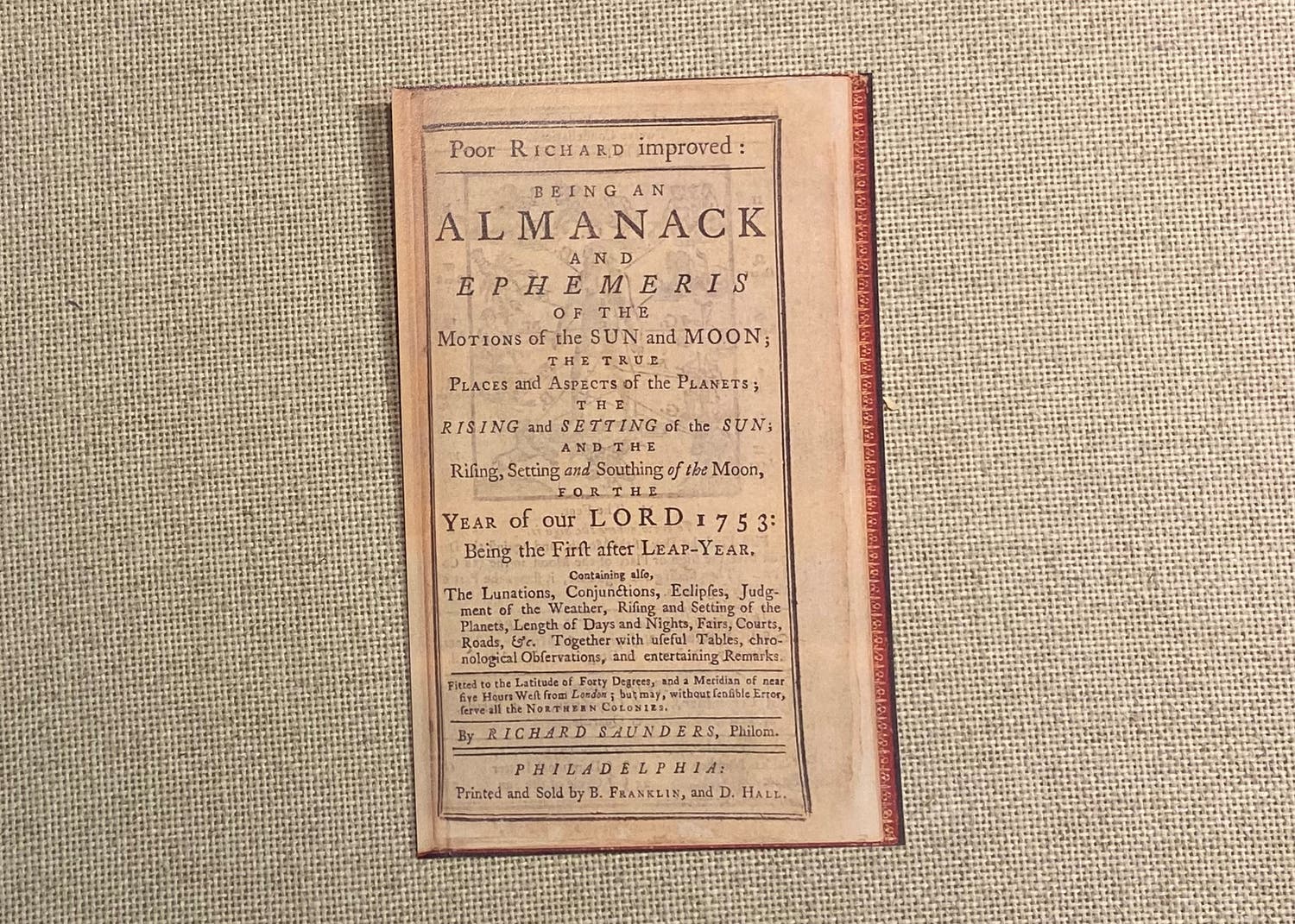 A reproduction of the front plate of Poor Richard's Almanack.