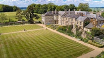 The manor house of Lamport Hall, with Charles Isham’s rockery at right center, recent photograph (discover-northamptonshire.co.uk)