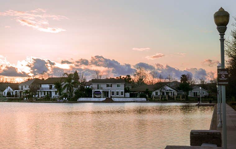 a view of homes across a lake in elk grove california