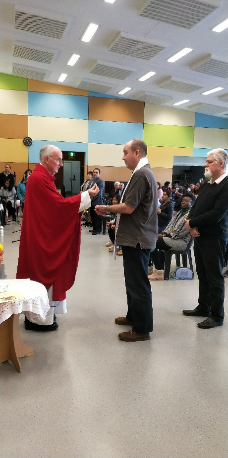 Gerrad receives First Eucharist