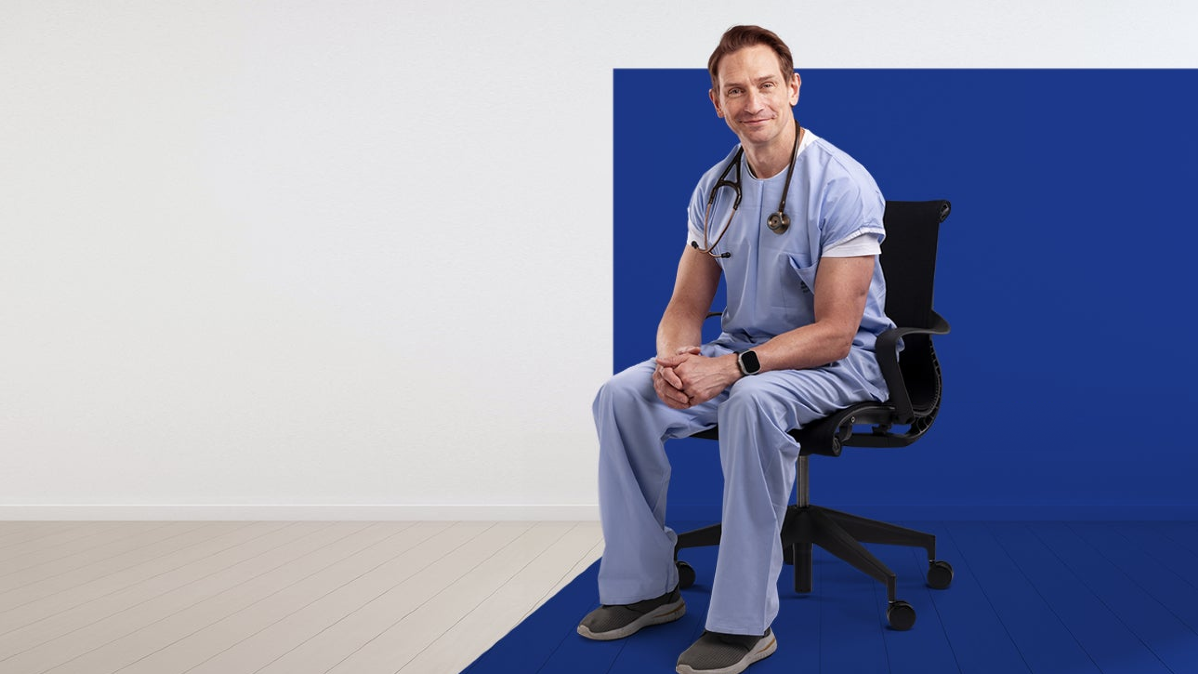 A doctor sitting in a chair