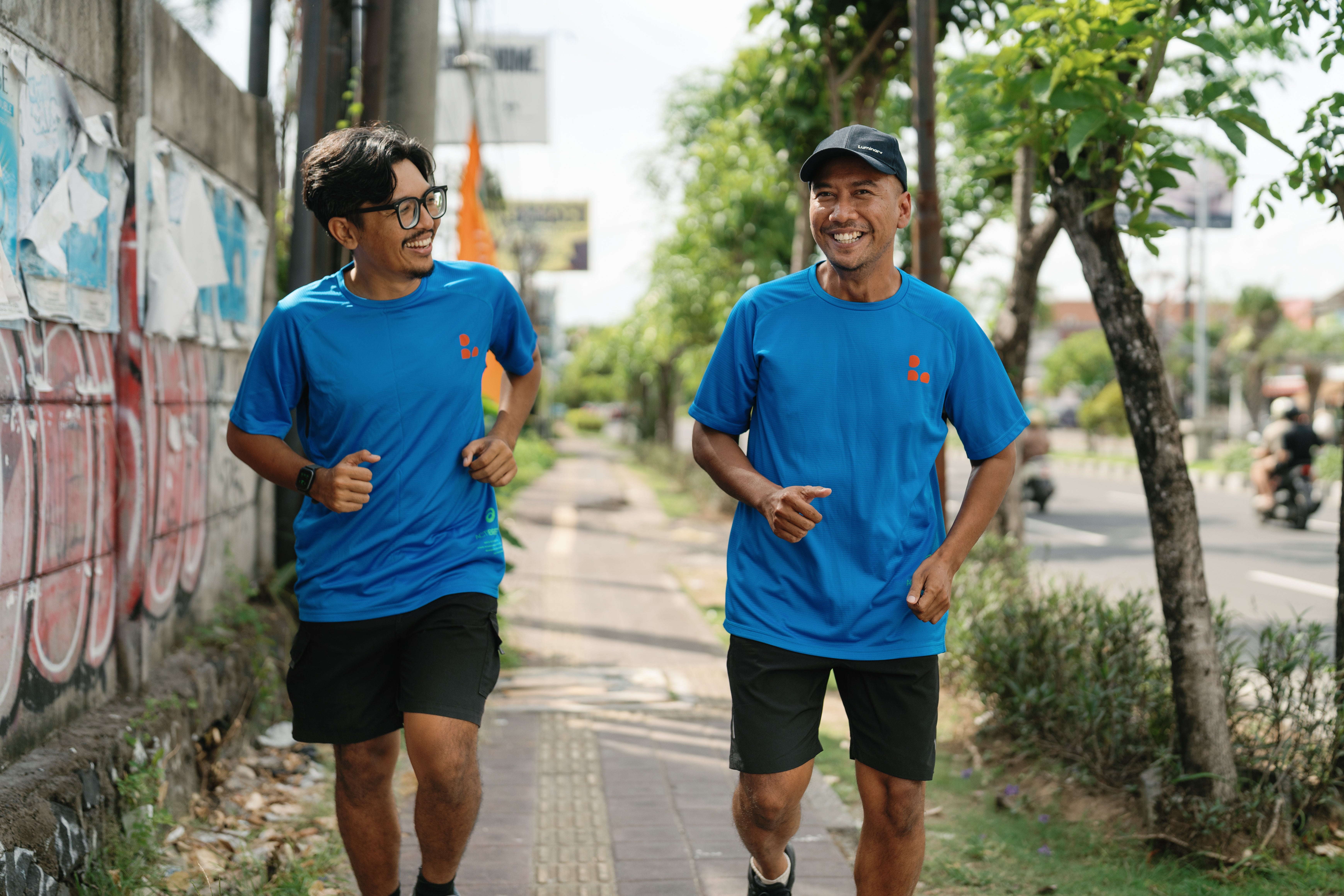 Picture of Jaka and Andik running in Bali, training for a BeFit fitness event.
