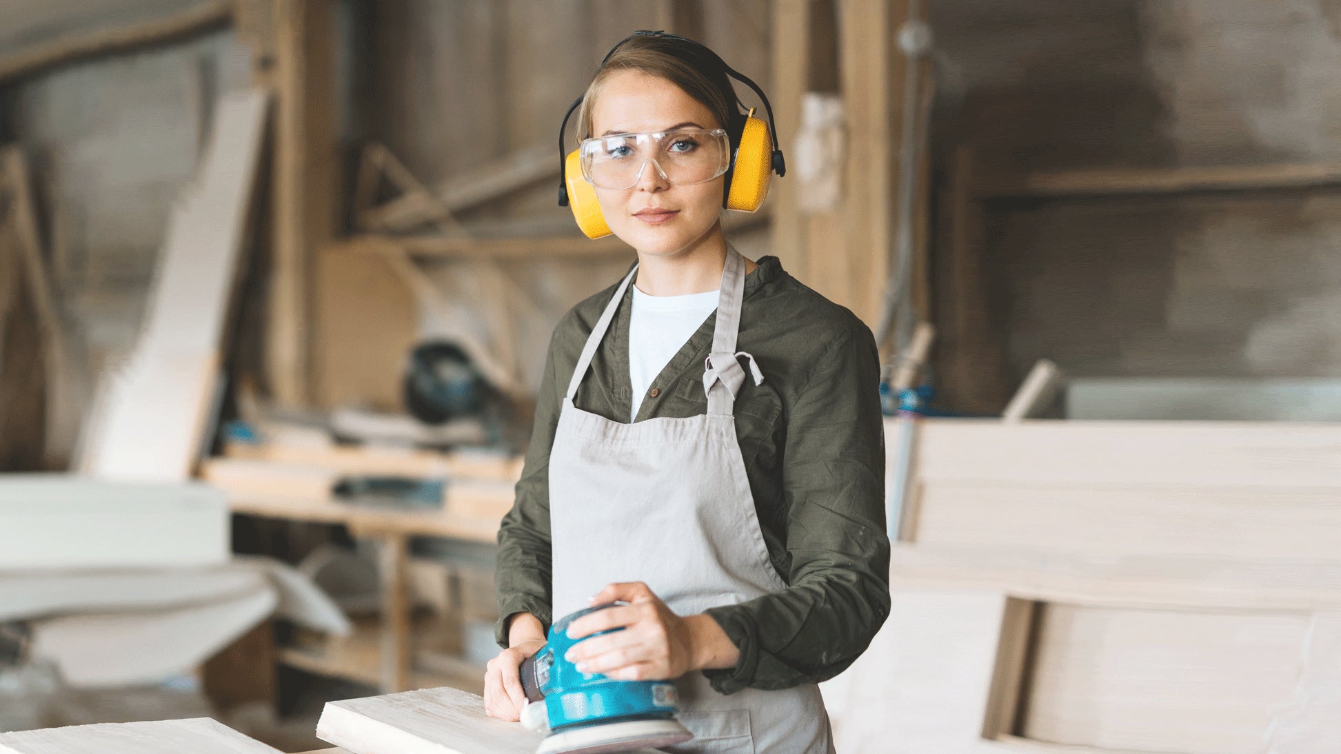 Woman with ear muffs on