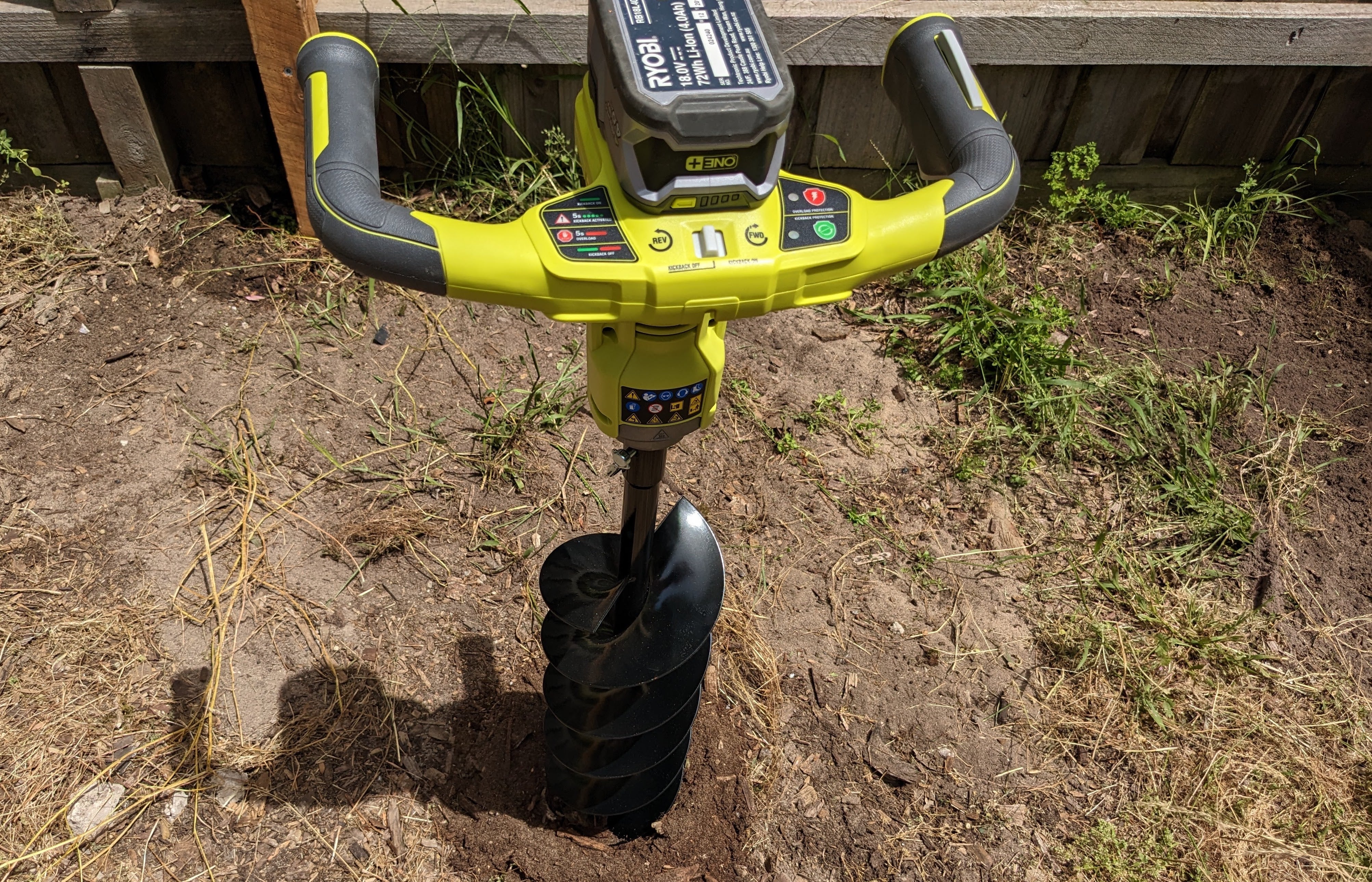 Picture of the Ryobi hole digger in an outdoor area