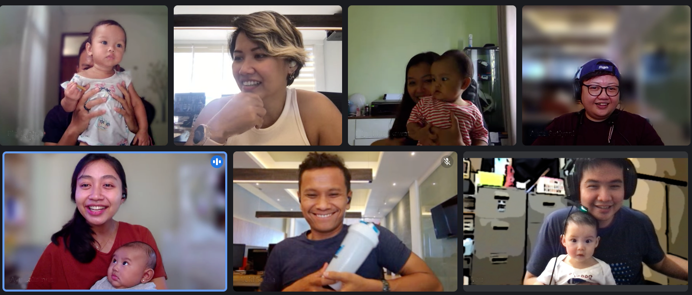Bali team working remotely holding up their babies to the camera in a Google Meet