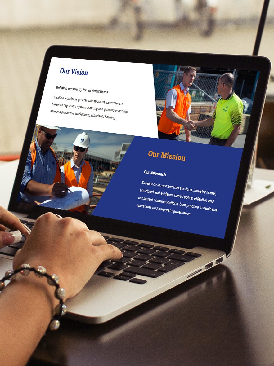 Master Builders website on a laptop device