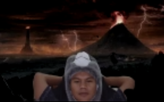Man with volcano background on Zoom