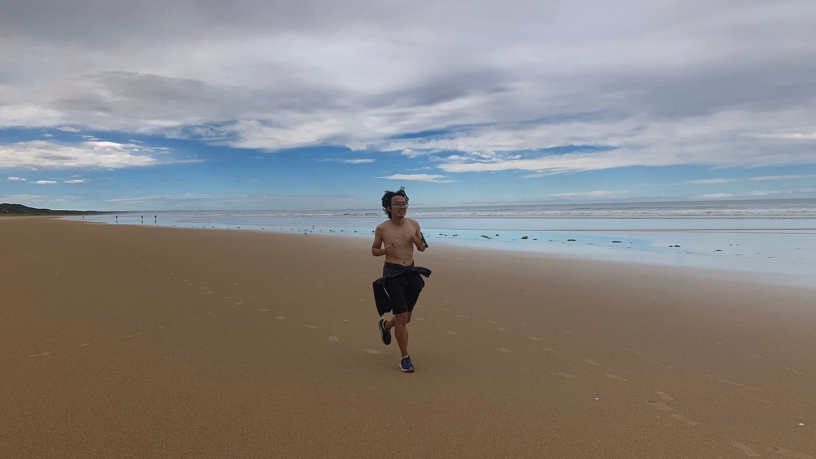 Tony running on the beach
