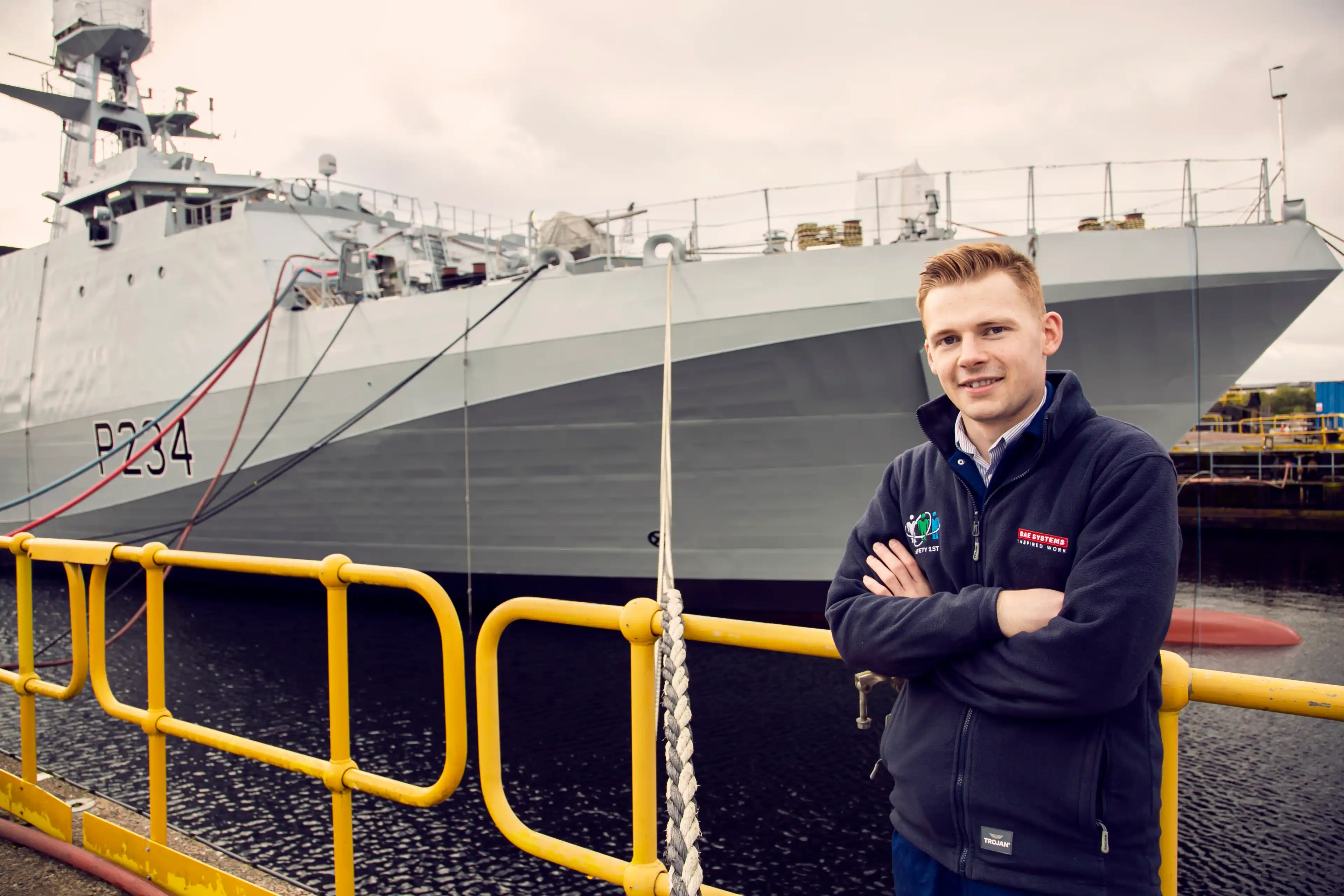 Marine teacher in front of a ship