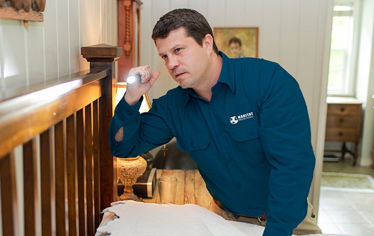 a tech inspecting in a home