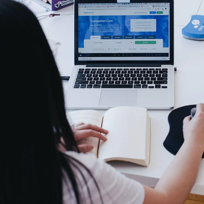 Image of woman working on laptop