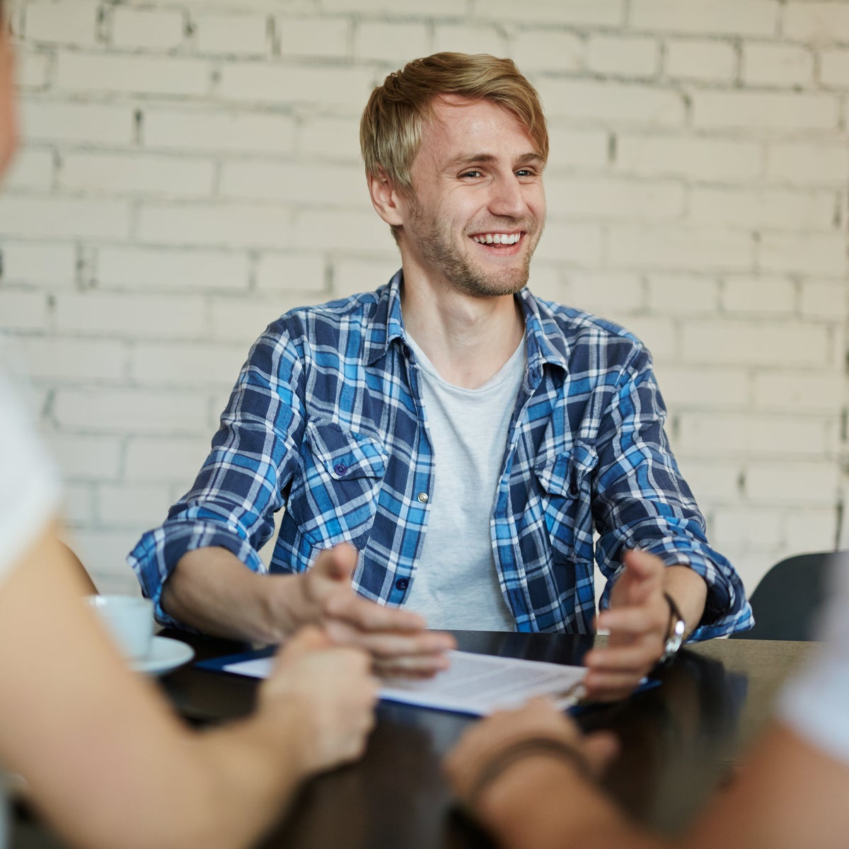 Smiling man at a desk